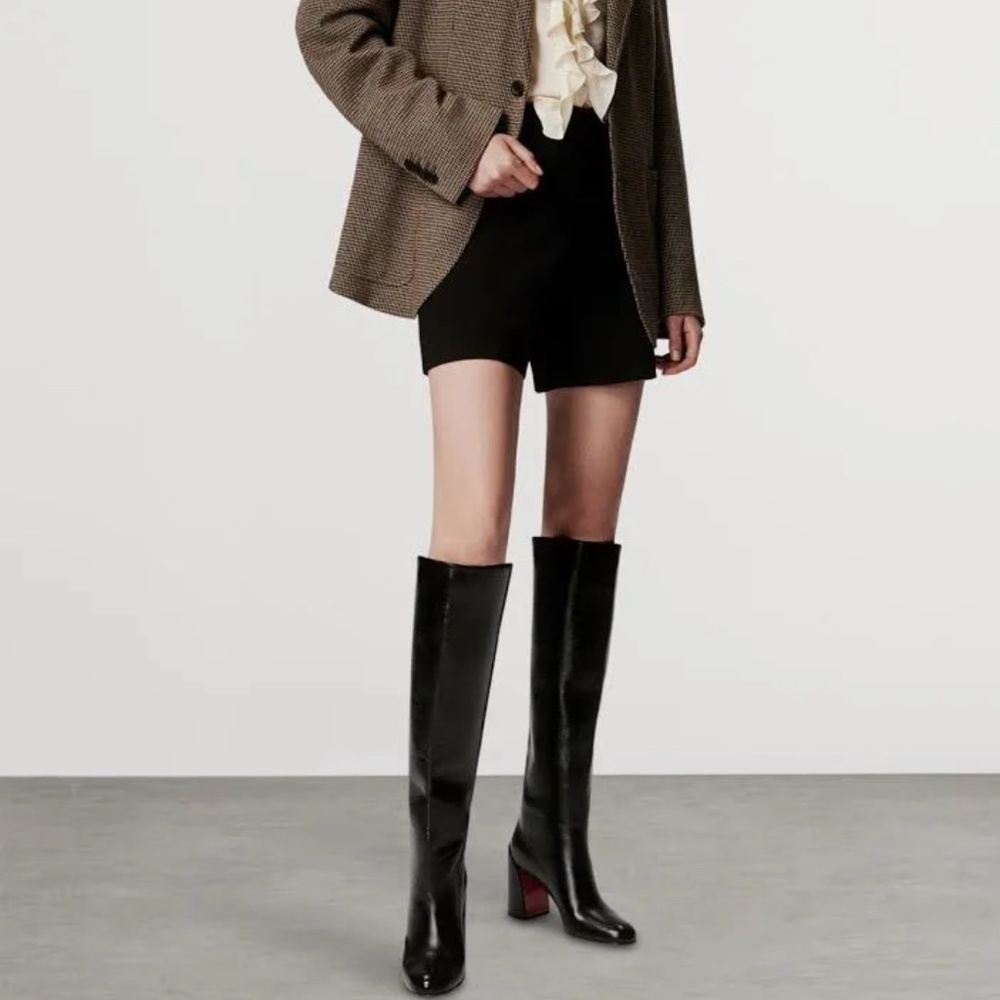 Knee high red bottom boots